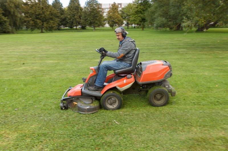 ride-on-mower--one-man-driving-min