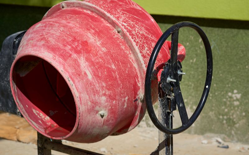 CONCRETE-MIXER-construction-electric-mini-concrete-mixer-on-sand-portable-cement-min