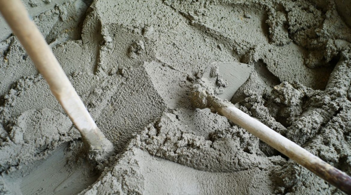 cement-mixers-texture-and-background-of-concrete-mixer-cart-and-tools-min