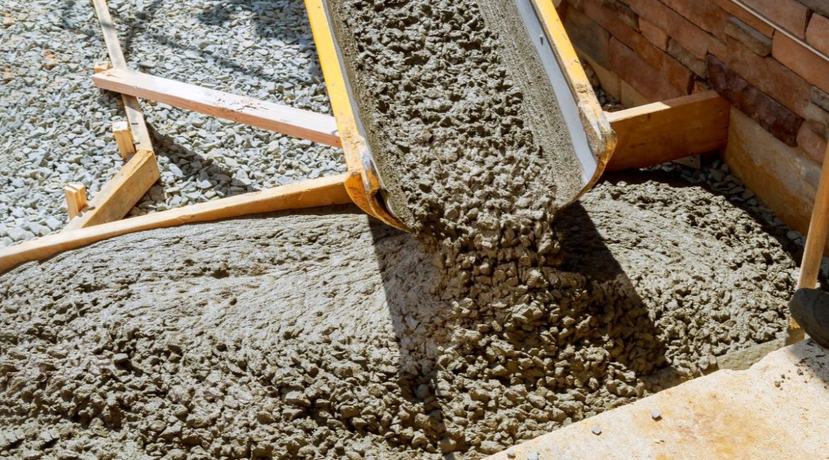 BS Power- concrete mixers - pouring-cement-during-paving-concrete-pavement-near-the-house-min