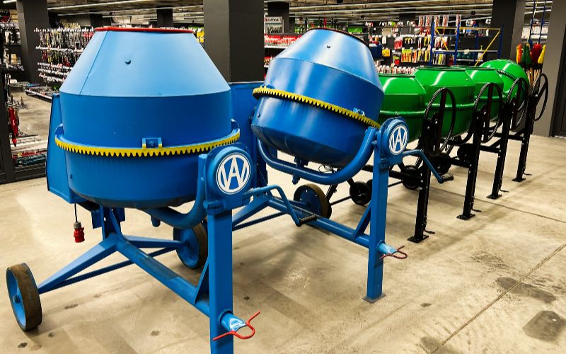 cement-mixers-row-of-industrial-cement-mixers-displayed-inside-a-modern-hardware-store-min