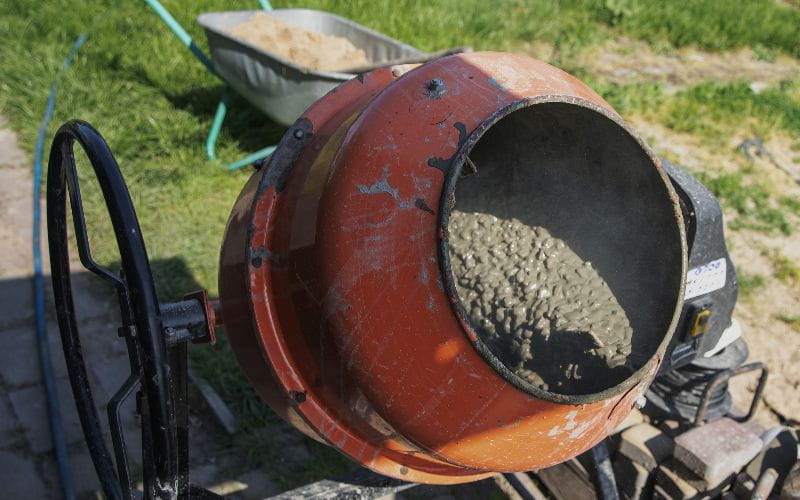 concrete-mixer-with-wet-cement-outdoors-at-construction-site (1)