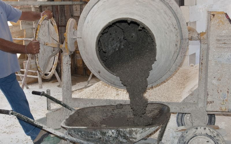cement-mixers-cement-being-poured-into-a-wheelbarrow (1)