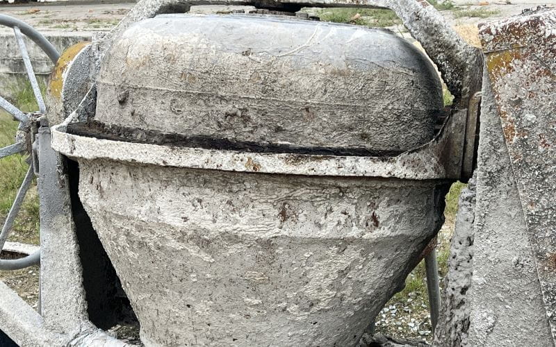 concrete-mixer-cement-mixer-machine-at-construction-site-tools-and-sand