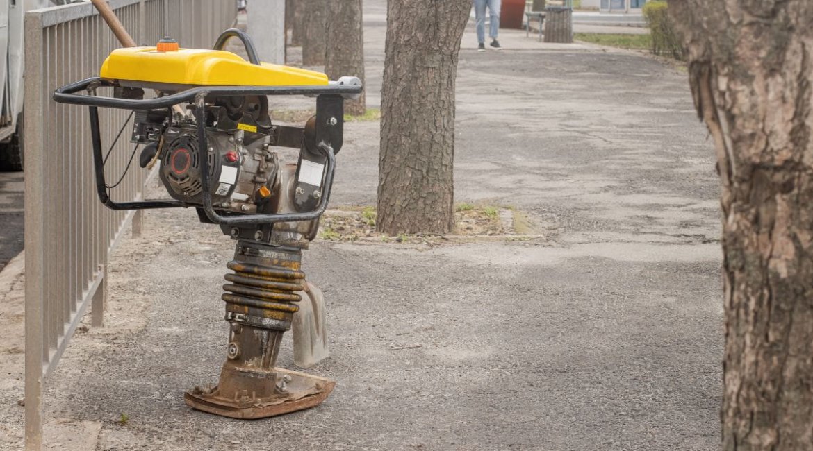 rammers-vibratory-rammer-compactor-on-sidewalk-during-road (1)