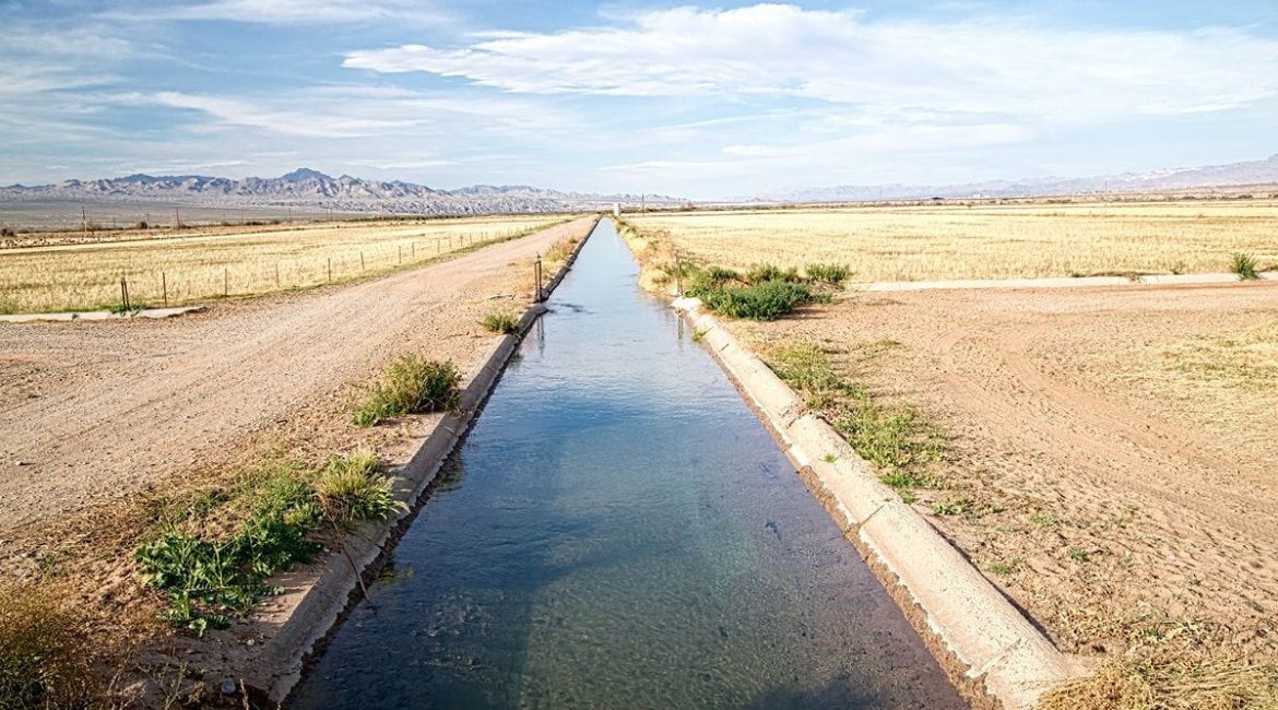 concrete-mixers-irrigation-ditch-with-flowing-water (1)
