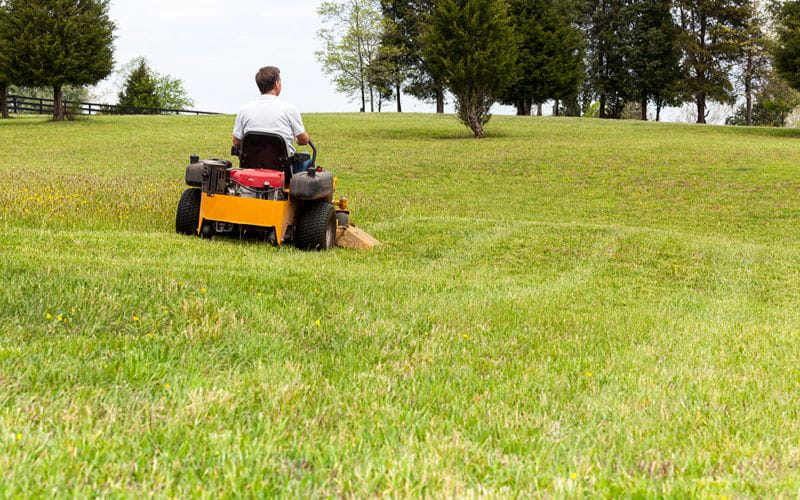 ride-on-mower-senior-man-on-zero-turn-lawn-mower-on-turf