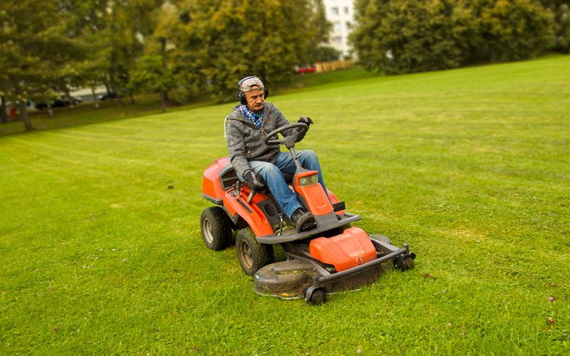 ride-on-mower-man-riding-lawn-mower