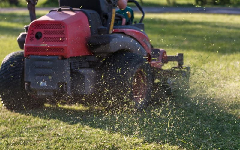 ride-on-mower-riding-lawn-equipment-with-operator