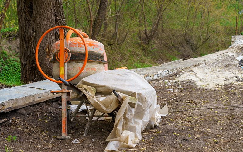 concrete-mixer-at-a-construction-site-background-with-selective-focus-and-copy-space (1)